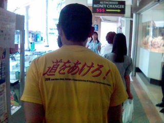 Illustration for article titled Foreigners in Stupid Japanese T-Shirts